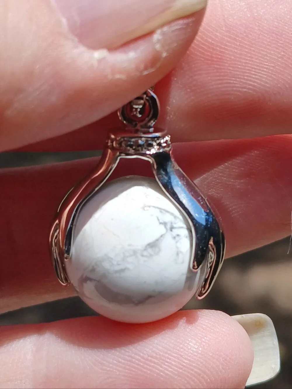 New 18K Hands Holding Howlite Sphere Pendant.